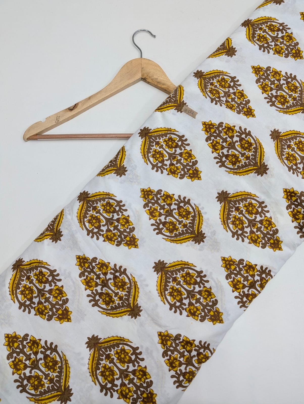 Yellow paisley cotton fabric with Rajasthani print