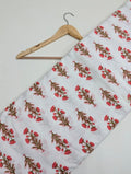 White cotton fabric with red floral print
