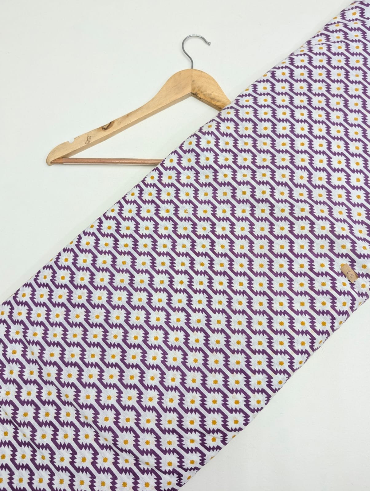 Purple geometric printed cotton fabric India
