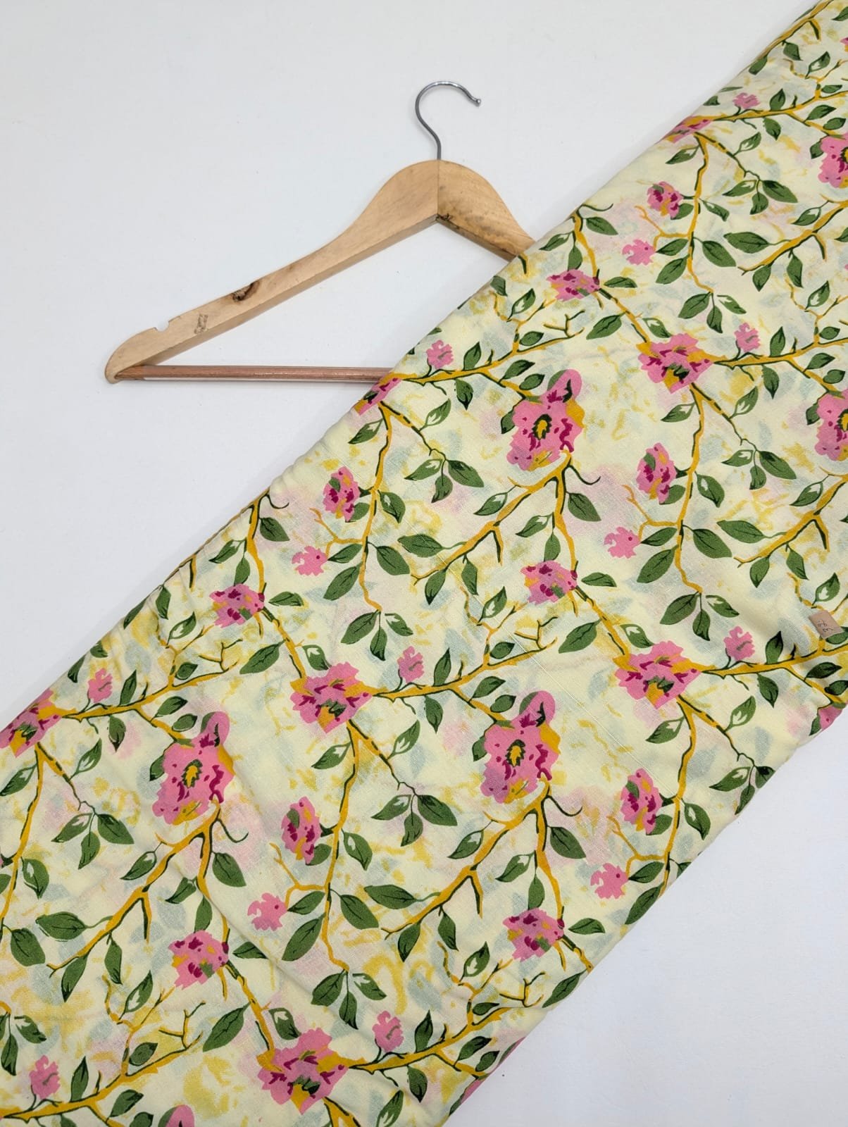 Yellow floral cotton fabric with pink flowers