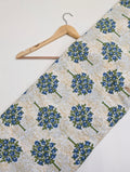 Blue floral tree print on light fabric
