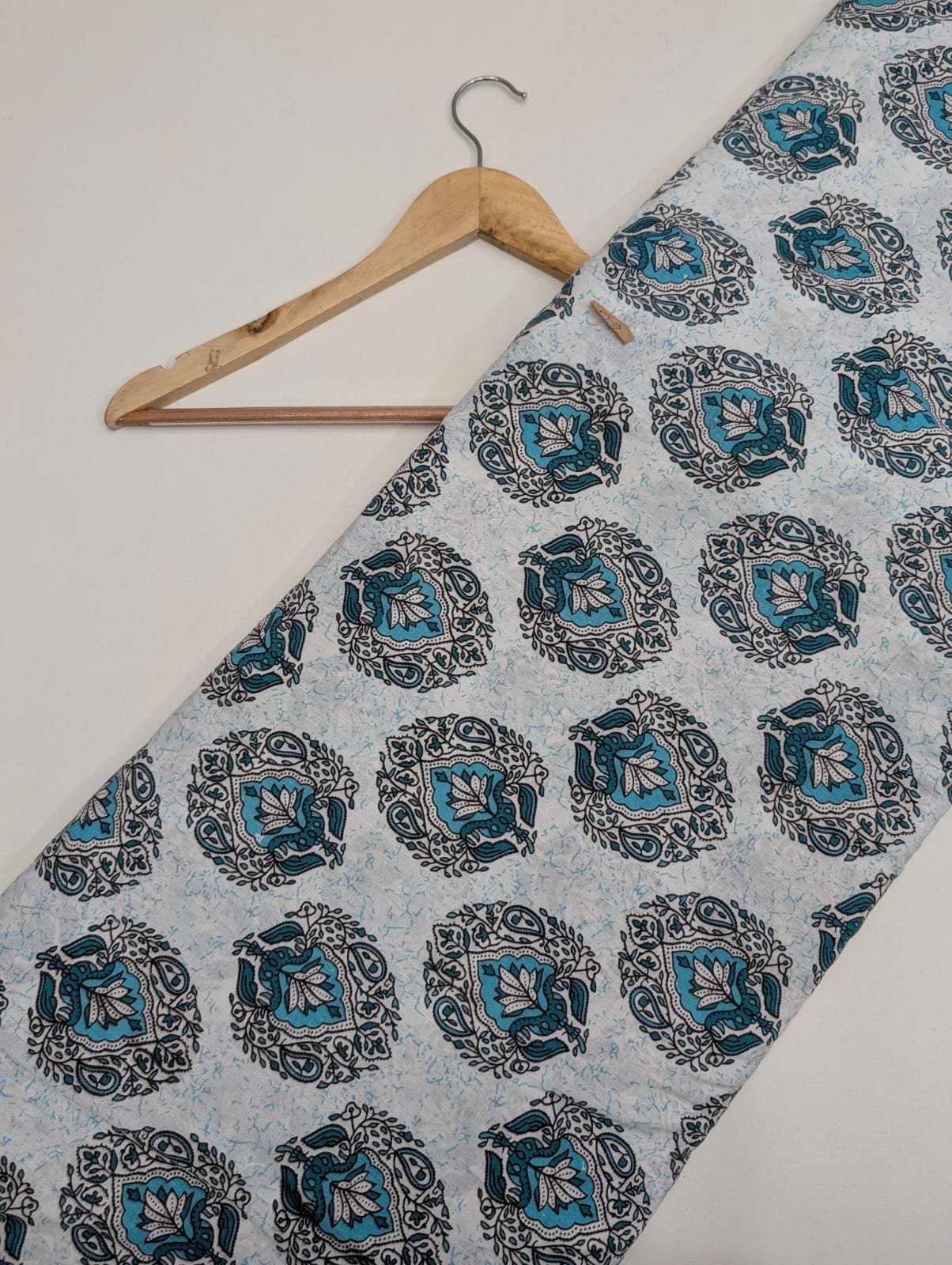 Teal mandala print cotton fabric with intricate motifs