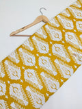Yellow ikat cotton printed fabric India