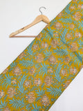 Yellow floral cotton fabric with traditional motifs