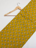 Yellow floral cotton fabric with small motifs