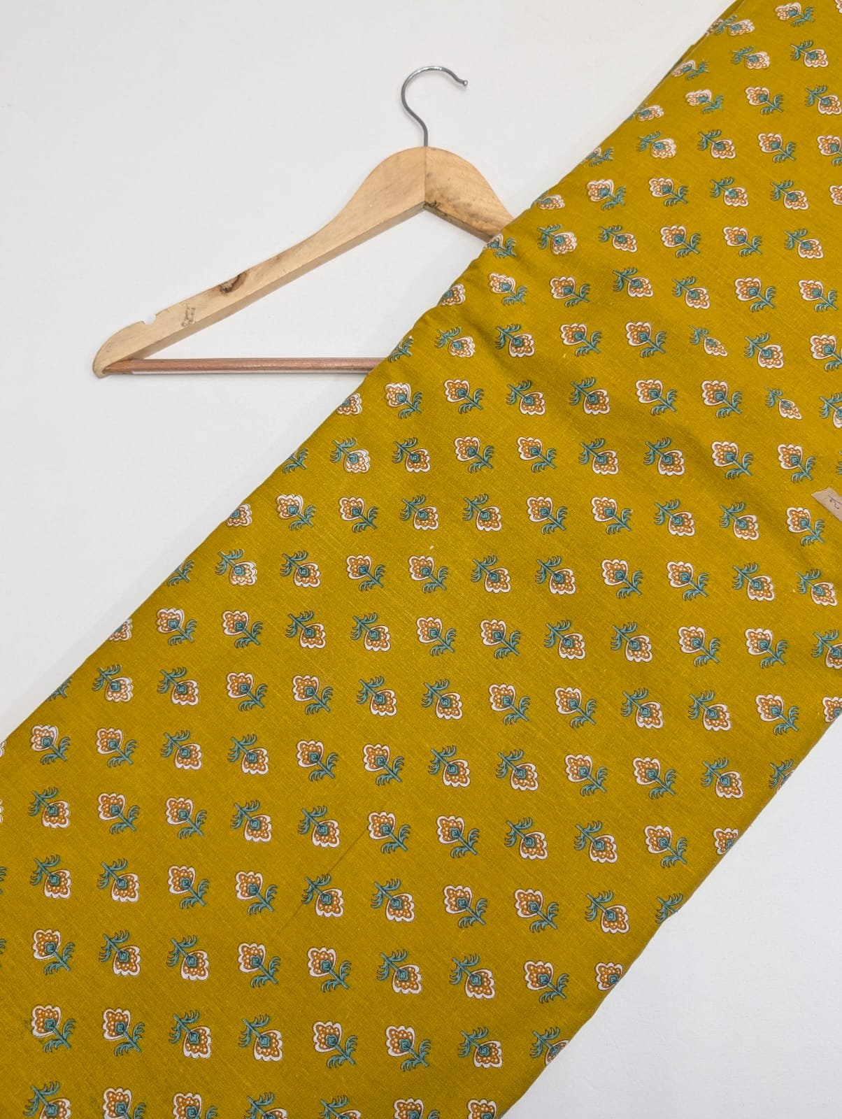Yellow floral cotton fabric with small motifs