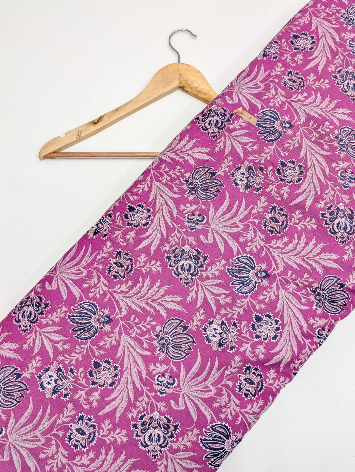 Pink floral cotton fabric with intricate design