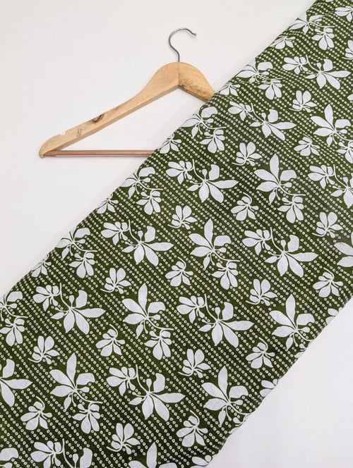 Green cotton fabric with white leaf pattern