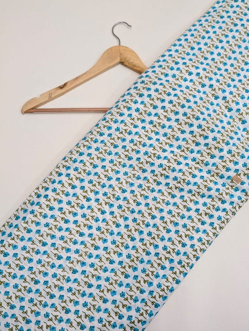 White fabric with blue floral traditional print