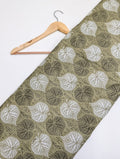 Olive cotton fabric with leaf pattern design