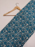 Teal cotton fabric with intricate floral pattern