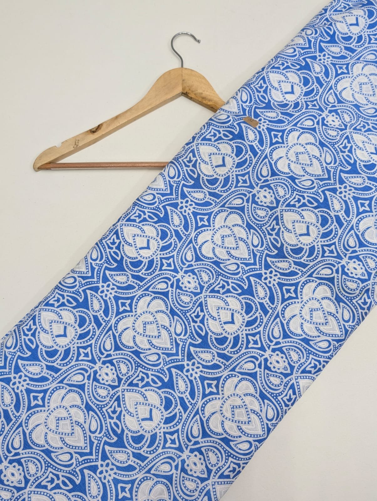 Blue paisley cotton fabric with intricate design