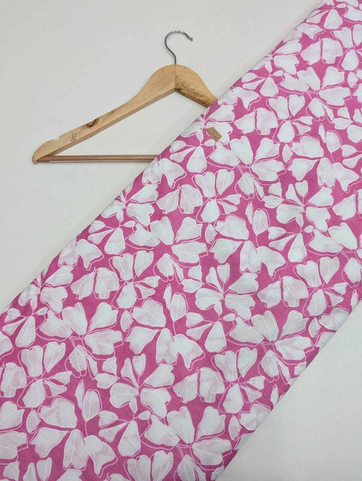 Pink petal print cotton fabric with white petals