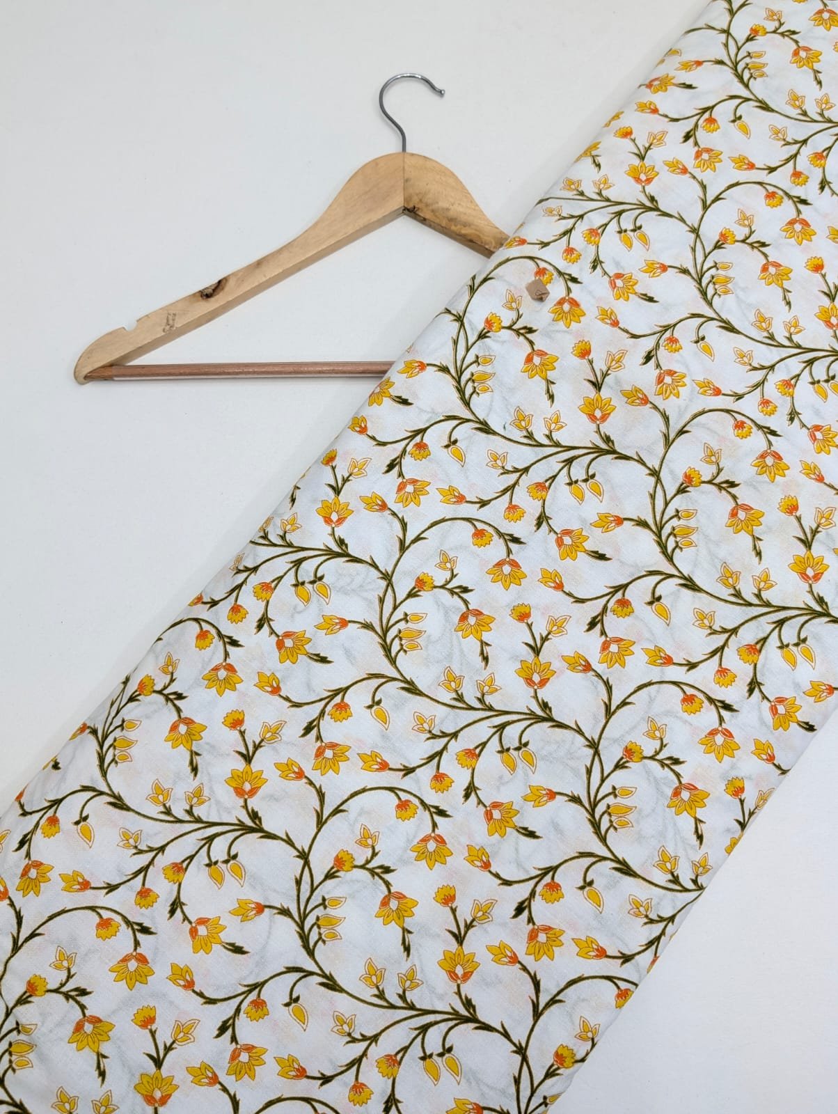 Yellow floral cotton fabric with branches pattern