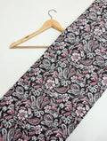 Black paisley printed cotton fabric with red accents